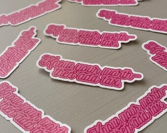 May include: Pink and white stickers with the phrase "Know your worth then add tax" in a cursive font. The stickers are scattered on a light gray surface, with a white border around the pink text.