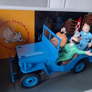 May include: A white ceramic mug with a black handle and the text "But First, Coffee" in a handwritten style. The mug is likely 11-15 ounces, perfect for a morning beverage.