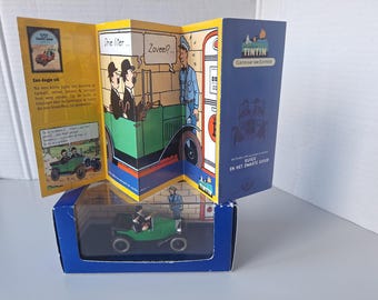 Un coche de Tintín del álbum: Tierra de Oro Negro