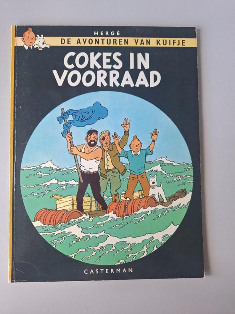 May include: A vintage comic book cover with a nautical theme. The cover shows three men and a dog on a raft at sea. The title "COKES IN VOORRAAD" is displayed, with the author's name "HERG&Eacute;" at the top. The background is dark blue.