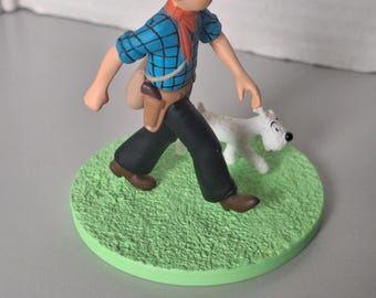 A figurine of Tintin with Snowy