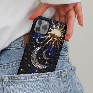Stained glass celestial phone case with dark blue and gold mosaic design