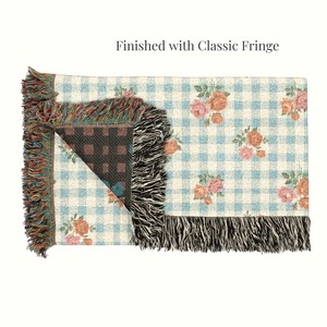 Cottage style woven blanket with pink flowers and blue gingham pattern