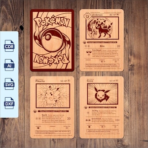 May include: Four rectangular wooden cards featuring laser-engraved Pokémon designs. One card shows the Pokémon logo and a Poké Ball, while the others depict Umbreon, Pikachu, and Eevee with their respective game statistics, attack names, and descriptions.