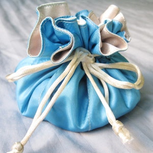 Baby Blue Drawstring Jewelry Pouch, Satin Travel Bag with Pockets, Fabric Organizer for Storing Earrings Necklaces Bracelets Rings Dice