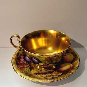 Aynsley Tea Cup and Saucer Orchard Fruit Gold Interior Signed D. Jones