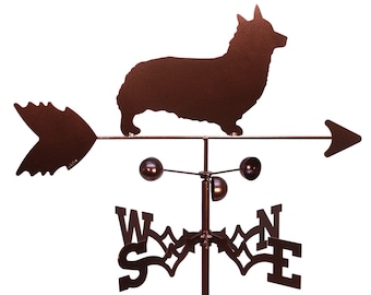 May include: A brown metal weather vane featuring a silhouette of a corgi dog. The vane has a directional arrow and the letters W, S, E, and N to indicate the cardinal directions.