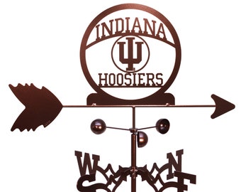 May include: A brown metal Indiana Hoosiers wind spinner with a basketball design. The spinner has a directional arrow and a compass rose with the letters N, S, E, and W.