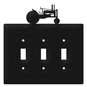 May include: Black metal light switch cover with a silhouette of a vintage tractor on top. The cover has three toggle switches.
