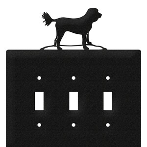 May include: Black metal light switch cover with three toggle switches and a silhouette of a dog on top.