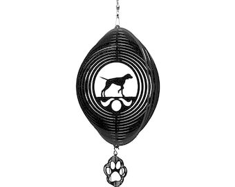 May include: Black metal wind spinner featuring a silhouette of a dog in the centre and a paw print hanging from the bottom.