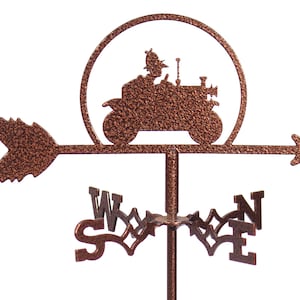 May include: A copper-colored metal wind vane with a silhouette of a vintage car and a driver. The wind vane has a directional arrow and the letters N, S, E, and W.