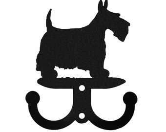 May include: Black metal double hook with a silhouette of a Scottish Terrier dog.