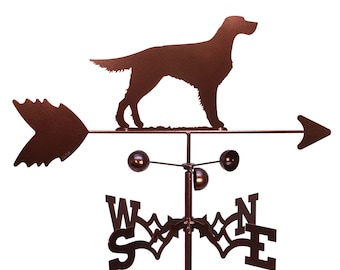 May include: A brown metal weather vane featuring a silhouette of a setter dog with a directional arrow and compass rose. The compass rose is labeled with the letters N, S, E, and W.