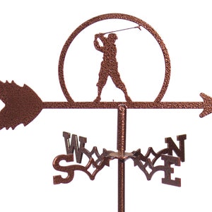 May include: A copper-colored metal golf-themed weather vane with a golfer silhouette in the center. The vane has a compass rose with the letters N, S, E, and W.