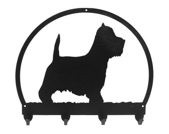 May include: Black metal key holder with a silhouette of a West Highland White Terrier in a circle. The key holder has four hooks.
