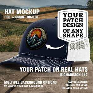 May include: A blue and white trucker hat with a patch that says "YOUR PATCH DESIGN OF ANY SHAPE". The hat is on a wooden surface with a green and brown background. The text "HAT MOCKUP" is at the top of the image.