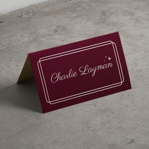 Burgundy folded name card, dinner place card.