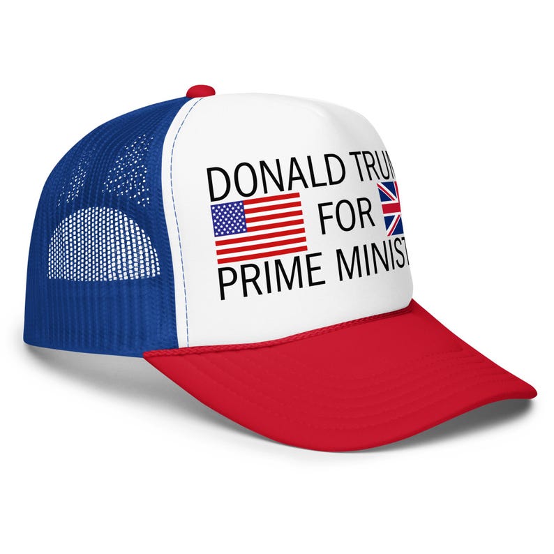 May include: A white, blue, and red trucker hat featuring a white front panel with the black text DONALD TRUMP FOR PRIME MINISTER, accompanied by a small American flag icon and a small United Kingdom flag icon printed on the front.
