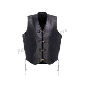 May include: Black leather vest with a V-neck and three metal clasp closures down the front. The vest has two front pockets and decorative stitching along the edges. The vest has a label that says "Patent Leather Store".