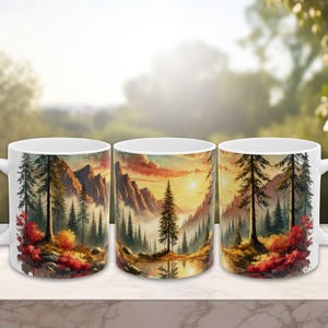 May include: Three white ceramic mugs with a scenic image of a forest with a lake and mountains in the background. The image is a watercolor painting style with a sunset sky and a reflection of the trees in the lake.