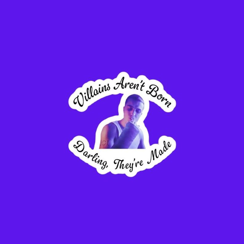 May include: A sticker on a purple background features a person with a tattoo, and the text "Villains Aren't Born Darling, They're Made" in a white, cursive font. The sticker has a white border.