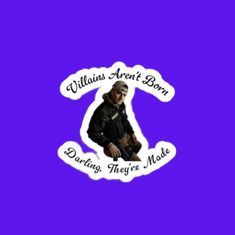 May include: A purple background with a white sticker featuring a person in a military-style jacket and cap, holding a gun. The sticker has the text "Villains Aren't Born, Darling, They're Made" in a cursive font.