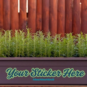 May include: A rectangular brown planter box filled with vibrant green rosemary plants. The box has the text "Your Sticker Here" in a teal script font. The background features a wooden fence.