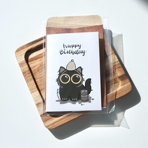 Black Cat Birthday Greeting Card – Cute Big-Eyed Cat with Birthday Hat, Kawaii Illustration Card for Cat Lovers