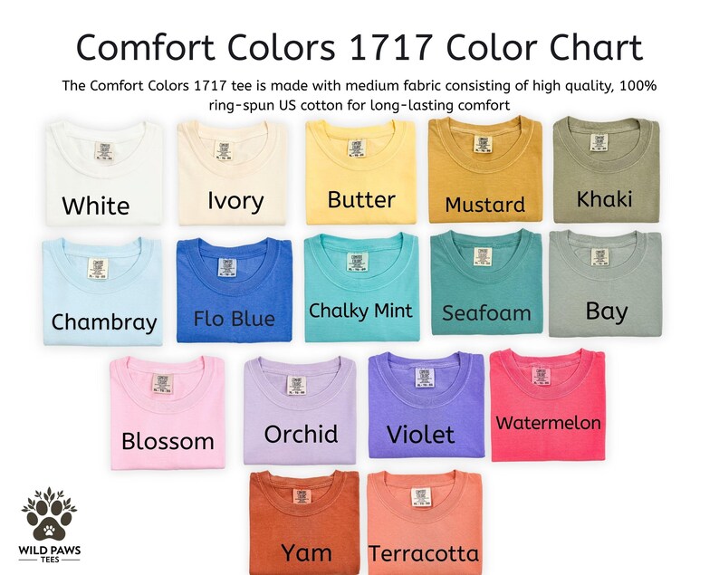 Op de afbeelding: Een kleurenkaart van Comfort Colors 1717 t-shirts in verschillende tinten. De kaart toont opgevouwen t-shirts in kleuren als wit, ivoor, boter, mosterd, kaki, chambray, flo blue, krijtachtige munt, zeegroen, baai, bloesem, orchidee, violet, watermeloen, yam en terracotta.