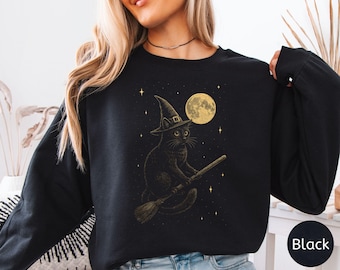 Bluza z nadrukiem „Czarny Kot na Miocie” na Halloween, koszulka z księżycem i kotem na miotle, koszulka z upiornym sezonem kotów, Cat Mama Halloween Comfort Colors®, uroczy prezent na jesień