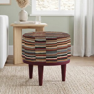 statement ottoman, compact furniture, handcrafted style, floor seating, chic home decor, comfortable stool, wood frame bench