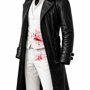 May include: A black leather trench coat with a double-breasted design, worn over a white shirt, vest, and pants. The white clothing has red stains. The coat features a notched collar, belt details, and buckle cuffs. The outfit is displayed on a mannequin.
