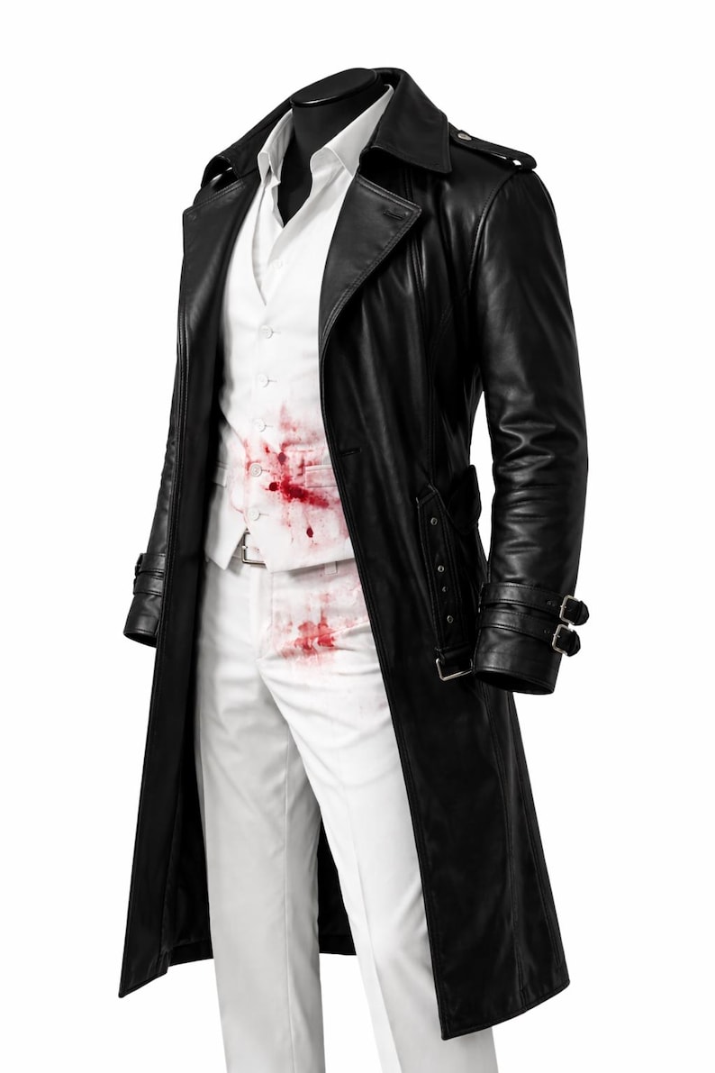 May include: A black leather trench coat with a double-breasted design, worn over a white shirt, vest, and pants. The white clothing has red stains. The coat features a notched collar, belt details, and buckle cuffs. The outfit is displayed on a mannequin.