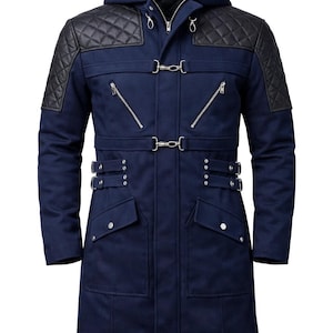 May include: A navy blue hooded coat with black quilted shoulder accents. The coat features a front zipper closure, multiple pockets, and decorative buckles. The design includes a belt detail at the waist and zippered pockets. The coat is a long, tailored style.