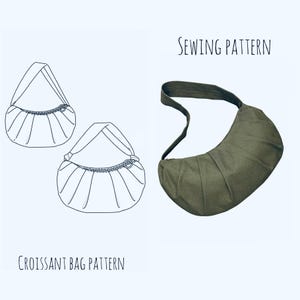 May include: A sewing pattern for a croissant-shaped bag. The pattern includes a line drawing of the bag and a photo of a finished bag made from green fabric.