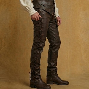 Side view of pirate leather pants men's lace up trousers showing detailed leather texture and adjustable fit for medieval and renaissance outfits.