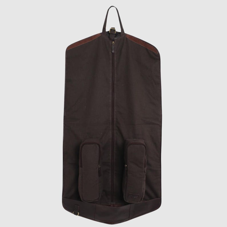 Luxury leather garment bag with monogram embroidery, created for destination weddings, formal events, and corporate travel – foldable and stylish gift idea for dads, boyfriends, or travelers.