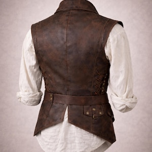 Handcrafted leather pirate vest for men, Renaissance festival and medieval LARP costume, Buccaneer cosplay outfit, Halloween pirate vest, distressed genuine leather, antique button details, soft lining, adjustable fit, perfect for cosplay, pirate-themed parties, steampunk events, Gothic outfits, and festival adventures.