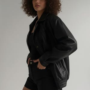 Winter Sheepskin Leather Jacket for Women, Handmade Oversized Bomber with Pockets and Button Front, Black Outerwear.