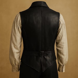 Back view of handmade pirate leather vest in distressed brown, vintage steampunk waistcoat style. Ideal for renaissance fairs, medieval cosplay, Halloween, LARP, and gothic festival outfits a perfect gift for pirate fans.