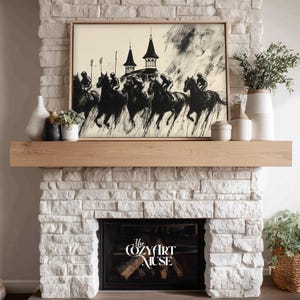 May include: Black and white framed artwork depicting a horse race with riders. The artwork is displayed above a wooden mantel on a white brick fireplace. Decorative vases and plants are arranged on the mantel. The text "The Cozy Art Muse" is visible on the fireplace.