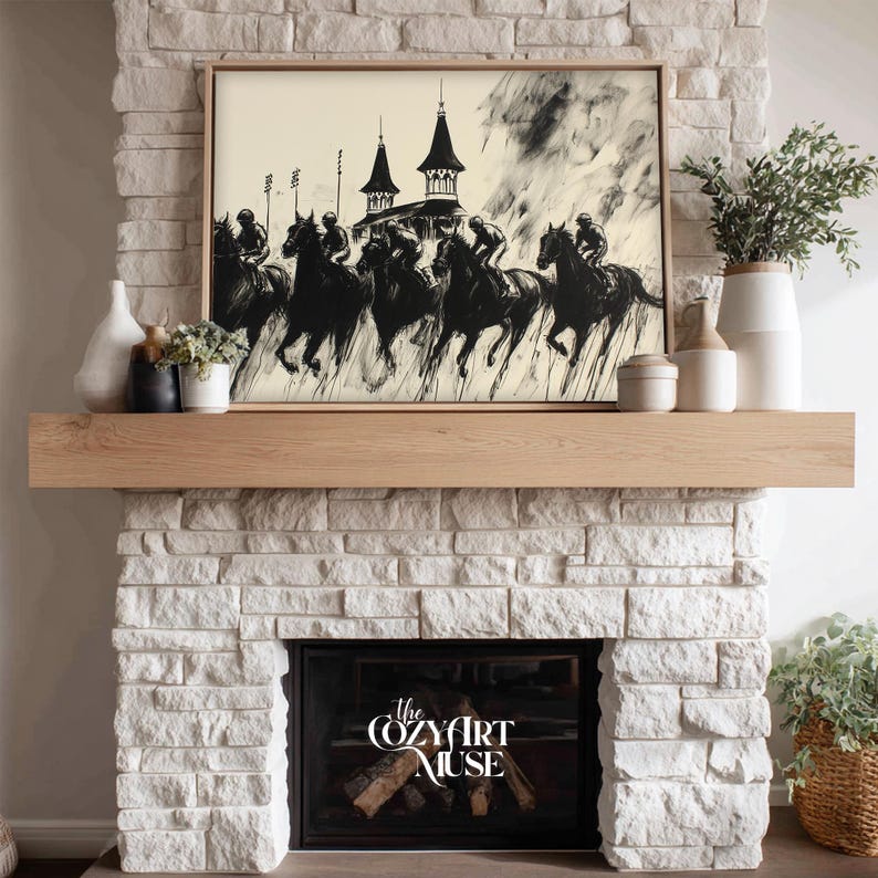 May include: Black and white framed artwork depicting a horse race with riders. The artwork is displayed above a wooden mantel on a white brick fireplace. Decorative vases and plants are arranged on the mantel. The text "The Cozy Art Muse" is visible on the fireplace.