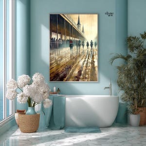 May include: A framed art print depicting a horse race in a rainy setting. The artwork features a long, covered structure with people watching the race. The scene is rendered in warm, earthy tones with reflections on the wet ground. The artwork is displayed in a bathroom setting.