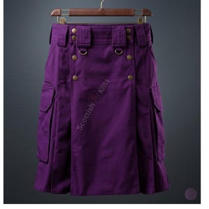 May include: A purple kilt with multiple pockets and brass-colored buttons. The kilt is hanging on a wooden hanger. The text "Scottish Kilts" is printed on the kilt.
