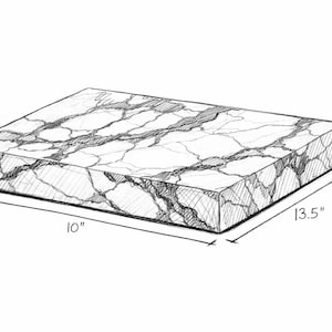 May include: A rectangular marble-patterned block, sketched in black and white. The block is 10 inches by 13.5 inches and 3 inches thick. The design features a white base with dark gray veining.