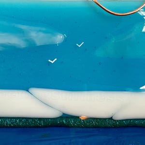 May include: A fused glass art piece featuring a bright blue sky with white clouds and two small white bird silhouettes. The number 248 is printed in the top left corner. A dark green horizontal band sits above a deep blue base section.