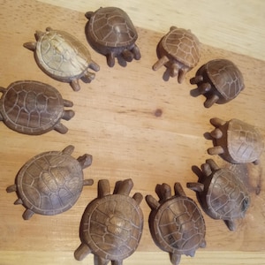 hand carved tiny little wooden turtle