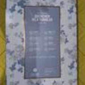 May include: Rectangular picture frame with a floral pattern in shades of blue and white. The frame has a central opening for a photo and includes the text "Decorative Picture Frames". The frame is made of a sturdy material.