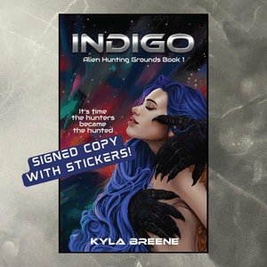 Podpisany egzemplarz Indigo z 3 naklejkami